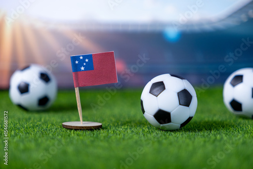 Miniature Samoa national flag with soccer balls on vibrant green grass, symbolizing international sports competition, global unity, and team spirit