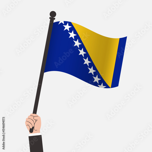 Hand Holding Bosnia and Herzegovina Waving Flag