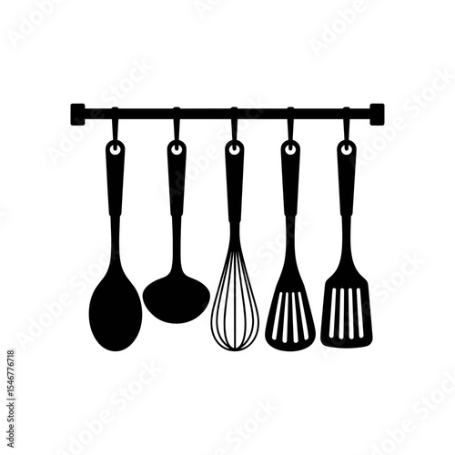Kitchen Utensil Rack: A stylish set of five essential kitchen utensils neatly hangs on a rack, ready for culinary adventures.  