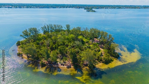 Drone view of small spoil island near Dunedin Causeway and bridge at Florida's west coast.