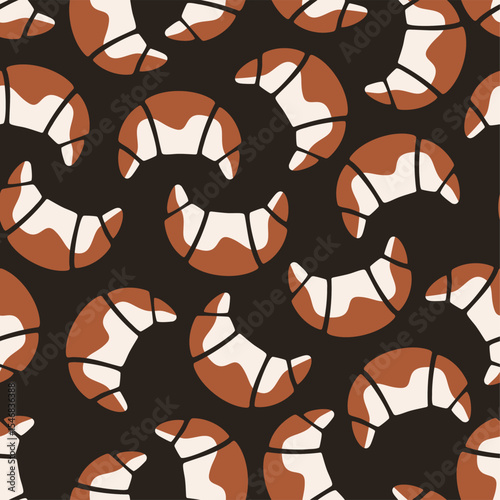Seamless pattern with croissants in brown and beige colors on dark background. Breakfast and pastry concept.