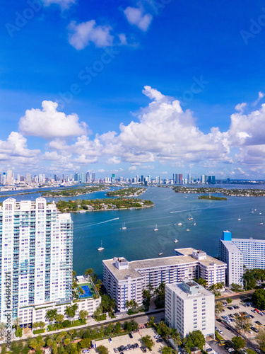 Beautiful Miami Beach scene. Image showing Condominiums on West Avenue and Biscayne Bay islands in the distance