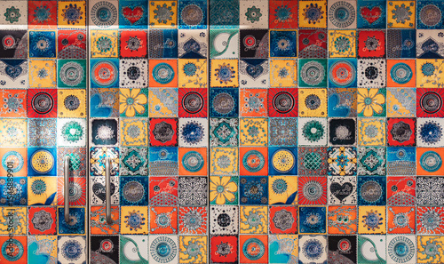 Vibrant Portuguese azulejo tiles in Lisbon, featuring intricate geometric and floral patterns. Perfect for design, travel, culture, and creative background inspiration.