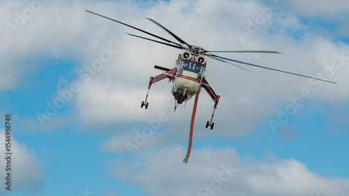 Forward, head-on view of a Type 1 firefighting helicopter in flight