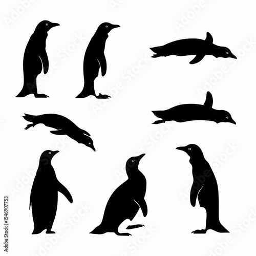 Penguin silhouette set, standing and swimming poses