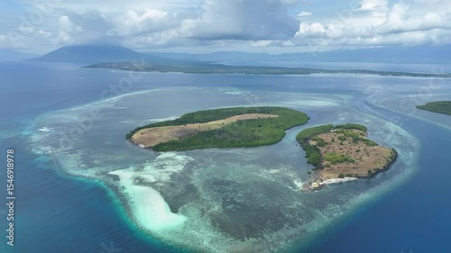 Reefs surround scenic islands off the coast of Adonara in the Lesser Sunda Islands of Indonesia. This tropical region supports some of the world's greatest marine biodiversity.