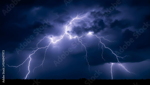 Stormy sky filled with web-like lightning veins.