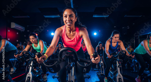 Woman leading a spin class at the gym