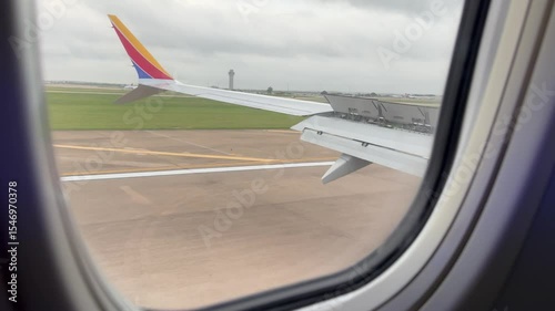 An aerial journey starts as a plane takes off, revealing views above