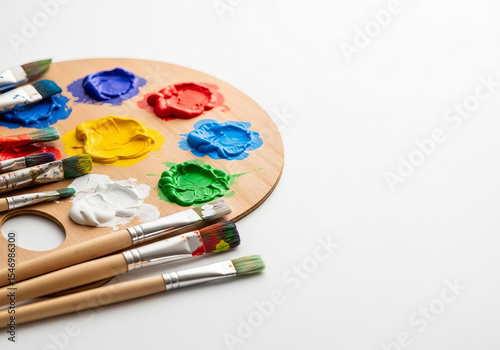 Wooden Palette with Paint and Brushes