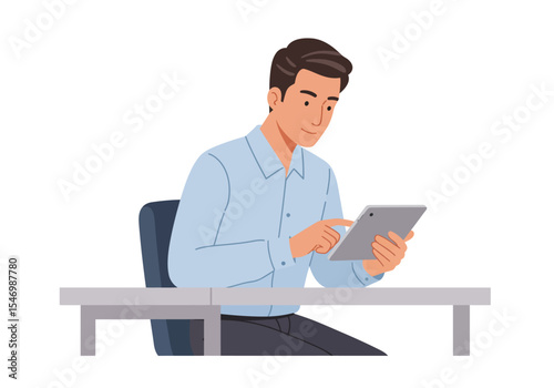 Man in light blue shirt sits at a gray desk using a gray tablet He looks at the screen with focus