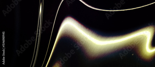 Abstract Wavy Yellow Light on Dark Background