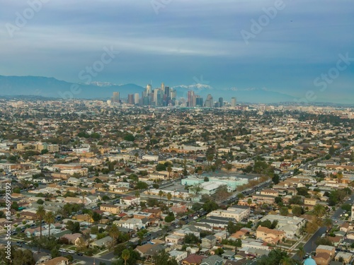 Los Angeles, USA: An aerial view shows the city skyline and surrounding neighborhoods. The photo captures the urban sprawl and the mix of residential and commercial areas.