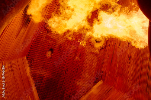Intense flame combustion in the interior of a steam boiler furnace at a thermal power plant