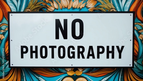 Phrase No Photography is displayed on an attractive signage board with clear text and beautiful background designs