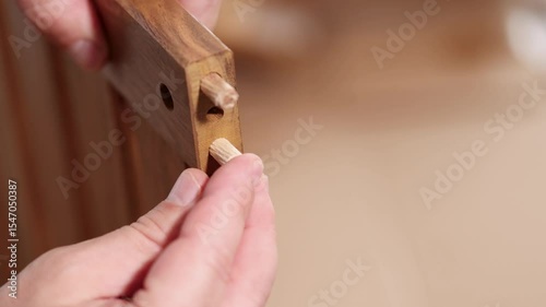 Wooden Furniture Assembly with Dowel and Hammer