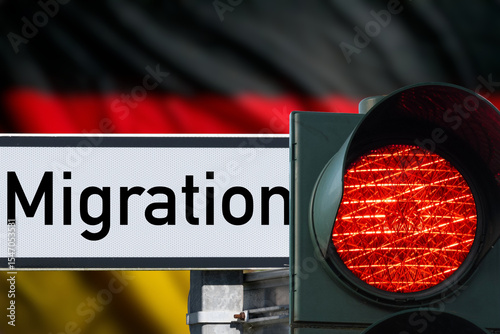 Flagge von Deutschland, rote Ampel und Begrenzung der illegalen Migration