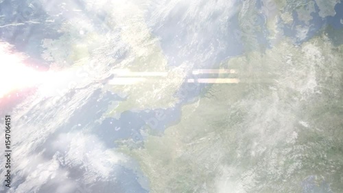 Earth zoom in from space and focus on Sheerness, England, South East England, Great Britain. Background for travel intro or blog. Satellite view. 3D style Animation. Images from NASA.