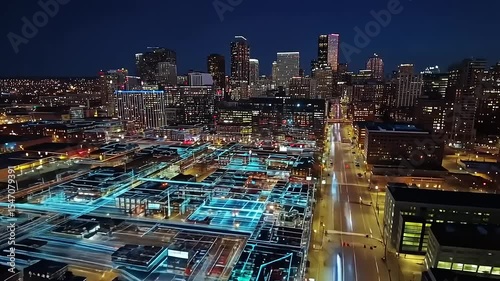 Aerial view of a vibrant city skyline at night, illuminated streets, and digital overlays showcasing urban connectivity