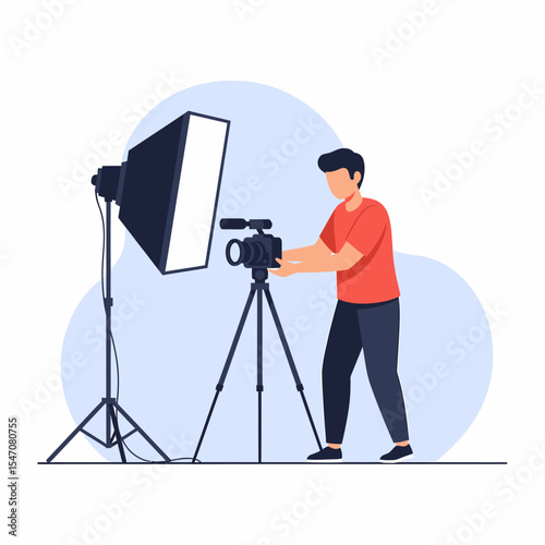 Professional Videographer Setting Up Camera and Lighting Equipment for Studio Shoot