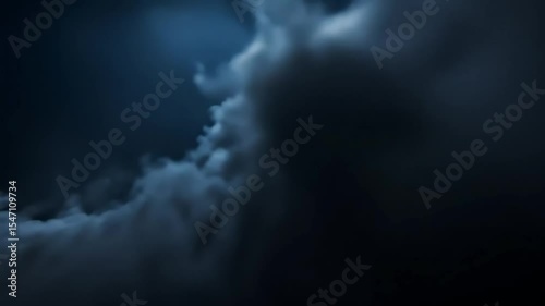 Moody Night Sky: Dark Clouds Swirling in Atmospheric Blue Hues