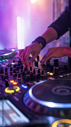 DJ skillfully manipulates sound mixer controls under vibrant stage lighting, creating dynamic music for a lively club atmosphere and energetic nightlife scene