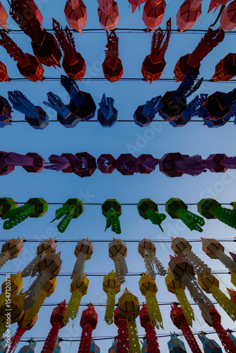 Colorful Lanna paper lanterns hang in Lamphun temples. Popular lantern festival during Loy Krathong in northern Thailand. Traditional Yi Peng paper lantern.