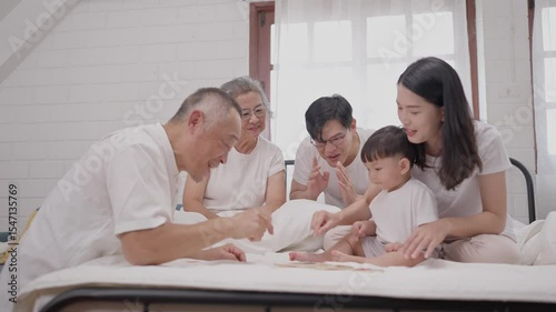 Family gathering brings joy and laughter to a cozy room filled with love and playful moments