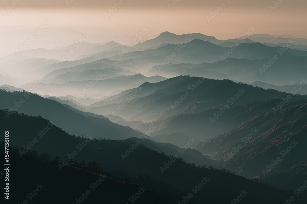 Fototapeta premium Misty Mountain Layers at Sunset with Desaturated Tones