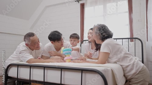 Family bonding time with child in bright room during playful afternoon