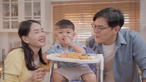 Family enjoys quality time cooking and sharing delicious meals in a bright kitchen