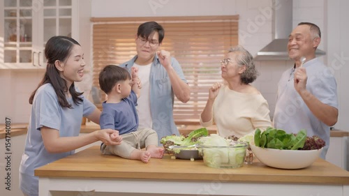 Family cooking together in a bright kitchen sharing laughter and joy during meal preparation