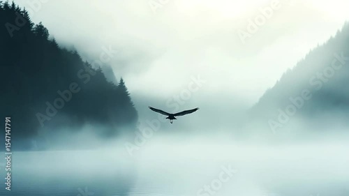 Majestic Eagle Soaring Through Misty Lake