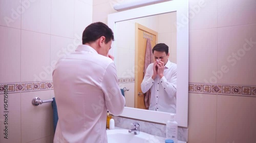 Employee feeling unwell but preparing for work