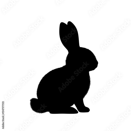 Silhouette of a Rabbit Resting with Its Long Ears Pointed Upwards and a Fluffy Tail