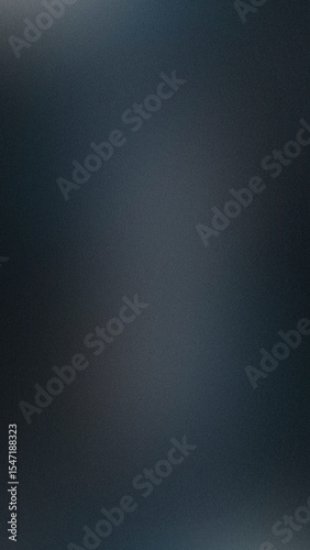 Dark blue and gray grainy subtle background with soft light effect.