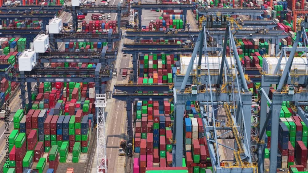 Modern container terminal managing logistics and freight transportation in hong kong, showcasing import and export operations within a dynamic global trade environment. Trade wars, tariffs