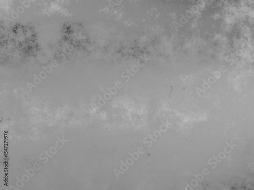 Abstract metal grunge texture with cloudy gray tones and rough surface.