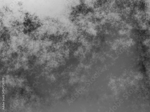 Heavy dark clouds creating an intense grunge texture with gray tones.