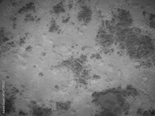 Rough cement texture with faded stains and cracks, creating a worn look.