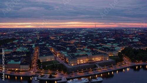 Wallpaper Mural Aerial panoramic view of Stockholm at twilight with dramatic cloudy sky, cityscape lights glowing, urban landscape concept, architecture, travel, tourism, city planning, infrastructure, Torontodigital.ca