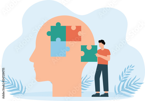 Puzzle Solutions,Head profile with jigsaw puzzle pieces falling apart. Alzheimers and dementia
