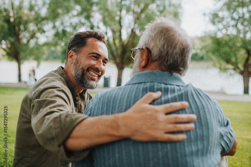 © Halfpoint - Happy dad and adult son enjoying peaceful afternoon outdoors © Halfpoint - Happy dad and adult son enjoying peaceful afternoon outdoors