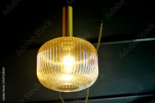 Vintage lamp hanging with dark ceiling background