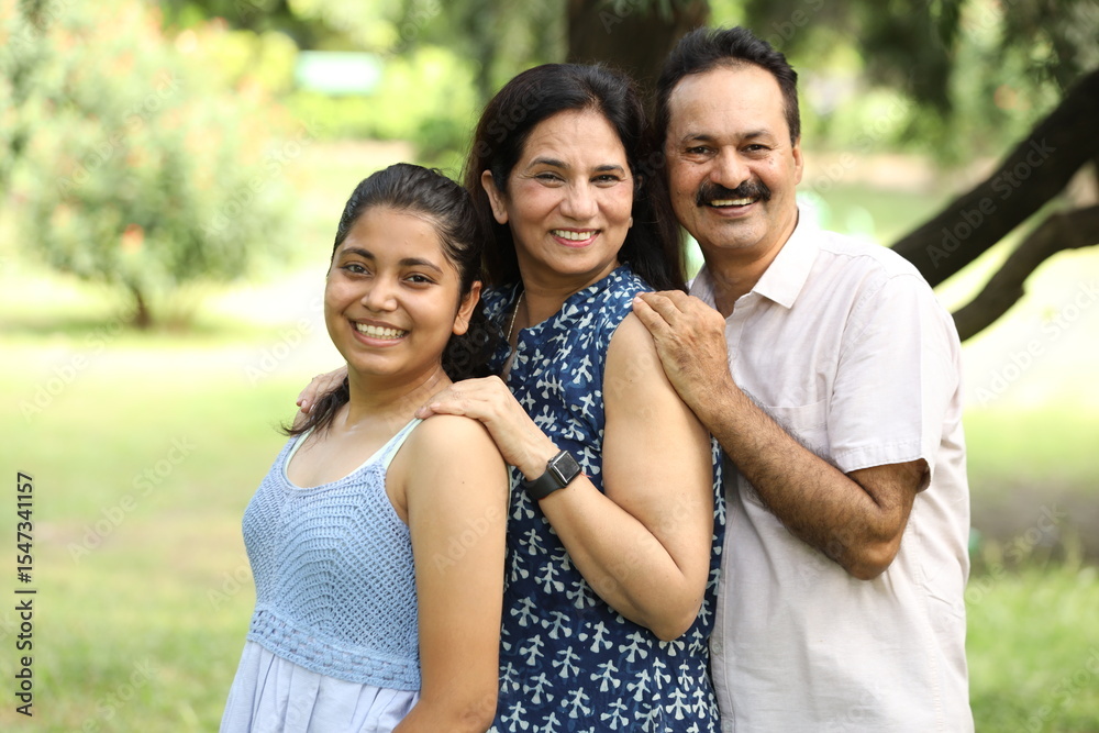 Fototapeta premium Indian happy family fun at park