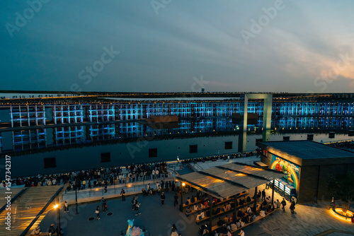 Osaka-Kansai, japan - may 2 2025 Visitors watch a water and light display