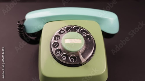 Vintage Rotary Dial Telephone. Retro Communication Concept for Nostalgia, History and Old Tech