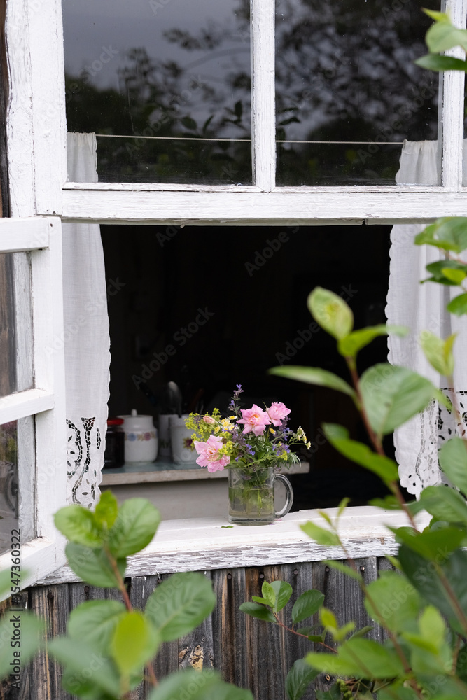 Fototapeta premium flowers in the window