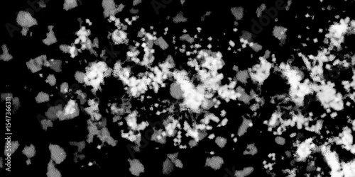 Snowflakes on dark background. white icy snowflakes isolated on black background, natural background. white crystalline powder on a black background. sugar dust. texture, pattern and clipping.