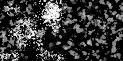 Snowflakes on dark background. white icy snowflakes isolated on black background, natural background. white crystalline powder on a black background. sugar dust. texture, pattern and clipping.